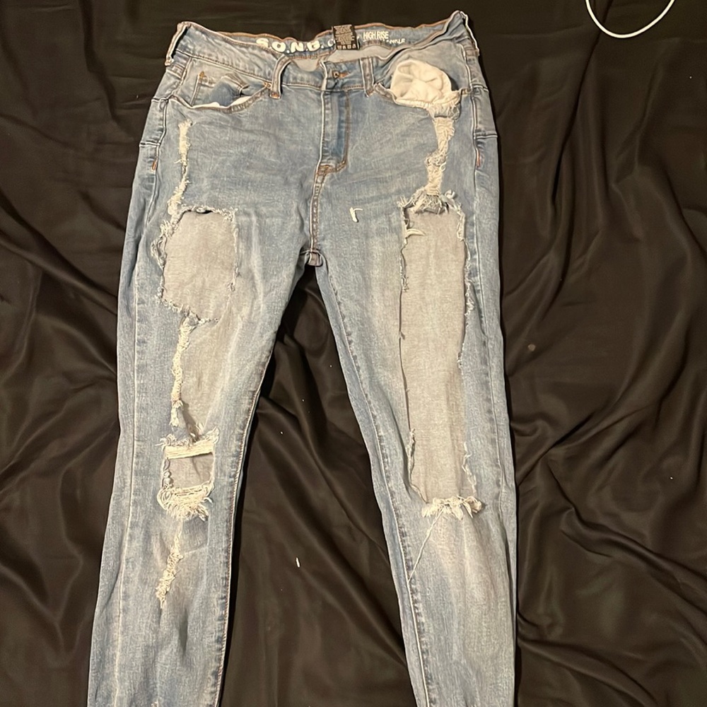 high rise super ripped semi skinny